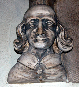 Head on west side of nave north east window October 2008